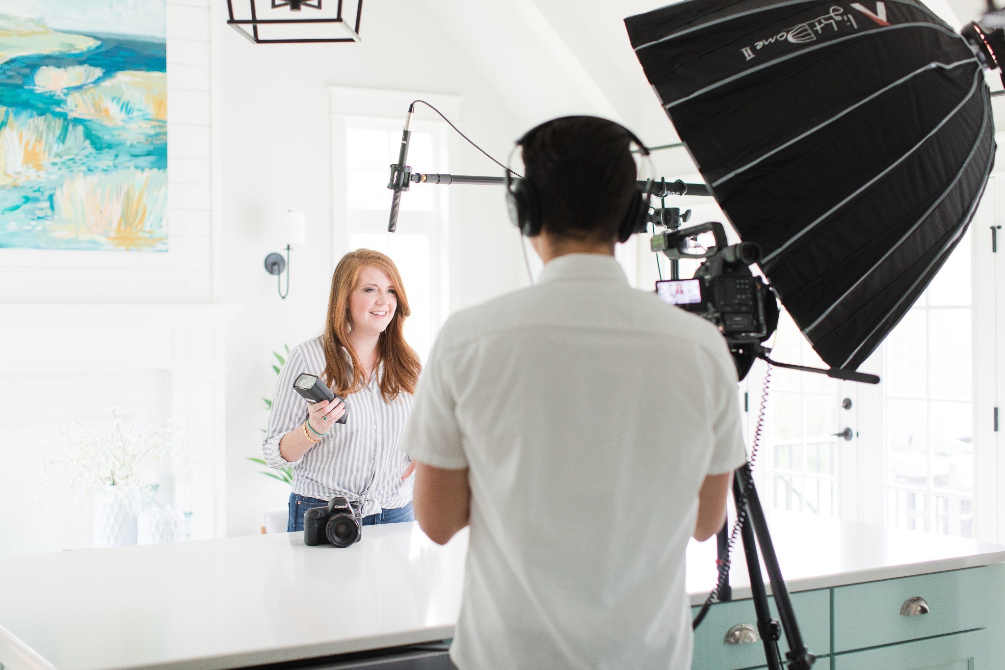 Tyler filming Katelyn James on location with camera, lighting, and boom audio